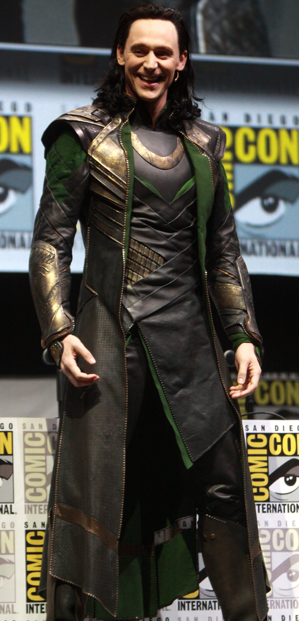 Tom Hiddleston smiling in his Loki costume at San Diego Comic-Con in 2013