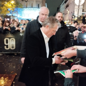 Hugh Grant greets fans at the Heretic premiere in Paris in November 2024.