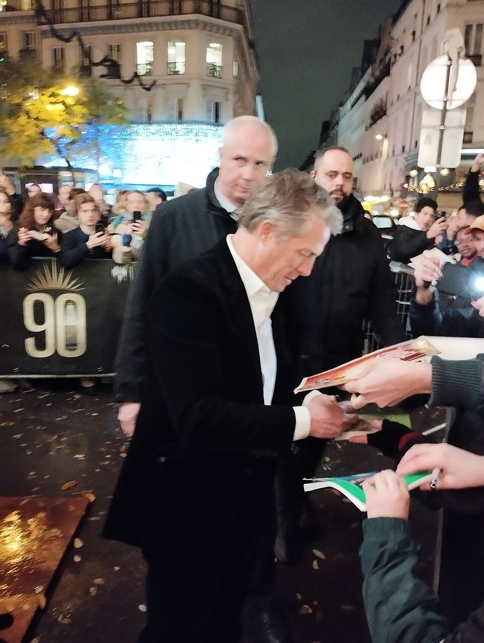 Hugh Grant greets fans at the Heretic premiere in Paris in November 2024.