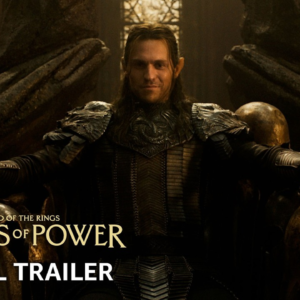 Official Prime Video trailer thumbnail showing armored Sauron with The Rings of Power title and Prime Video branding.